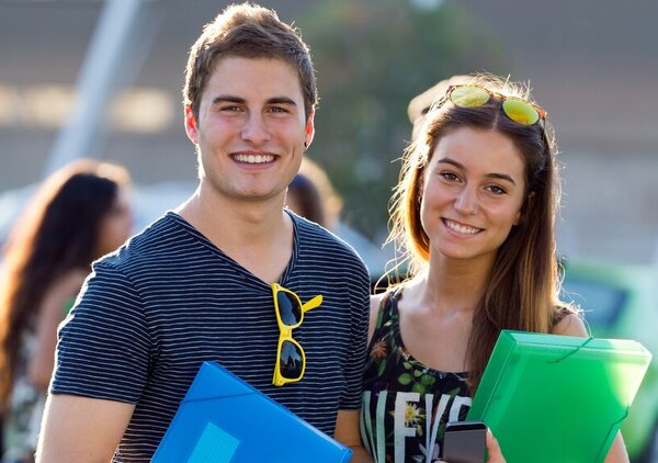 young_students_looking_camera_after_class_site_1_1024_2500